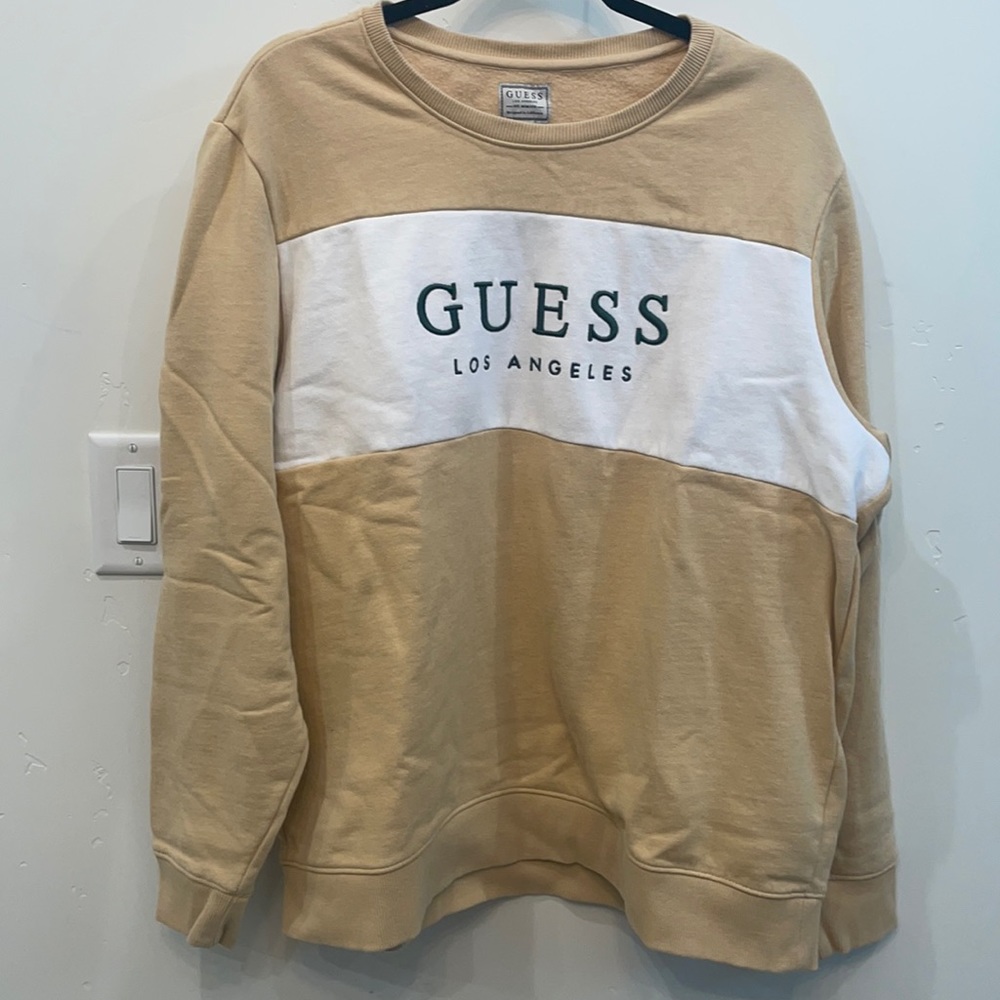 Very pale yellow/tan Guess Los Angeles  sweatshirt.